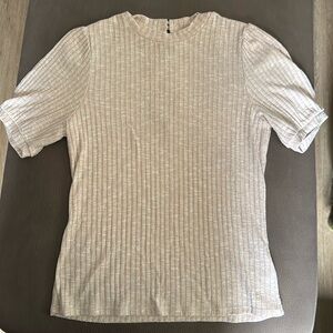 Short sleeve slightly pinkish/peach color